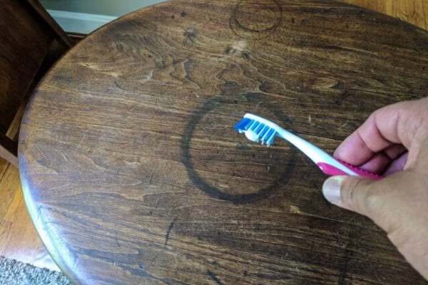 Cleaning a stubborn black water ring mark from a solid timber table