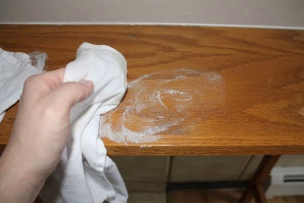 Cleaning cloudy white marks and blemishes from a solid oak furniture surface