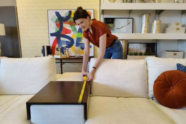 Professional living room space planning and measurement verification stage